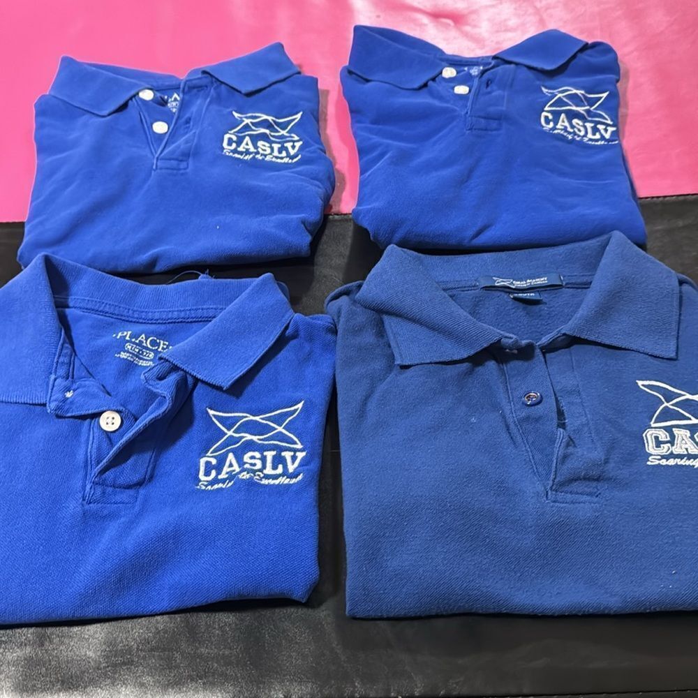Coral Academy Blue Size Medium 7/8 shirts. Bundle of 4.​